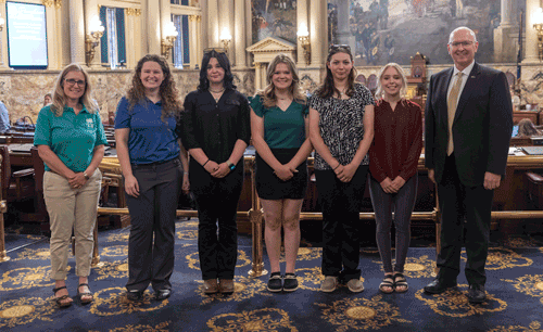 Pictured from left: Thankful Batterson, 4-H leader; Spencer Gee, extension educator; 4-H students Baylee Hazel, Alexis Risser, Elizabeth Freeman and Dana Williams; and Causer.